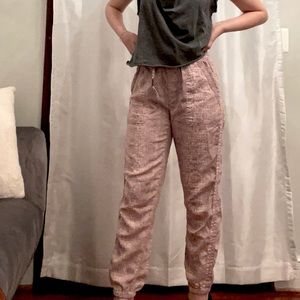 Anthropolgie pink snakeskin-print joggers